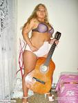 LusciousModels Curvy Meile, playing with her guitar - part 1