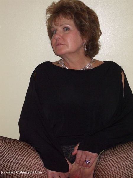 Auntie Busty in Boots and Stockings