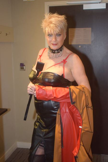 Mistress Divine arrives at a clients