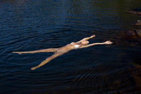 flossing with extreme bikini